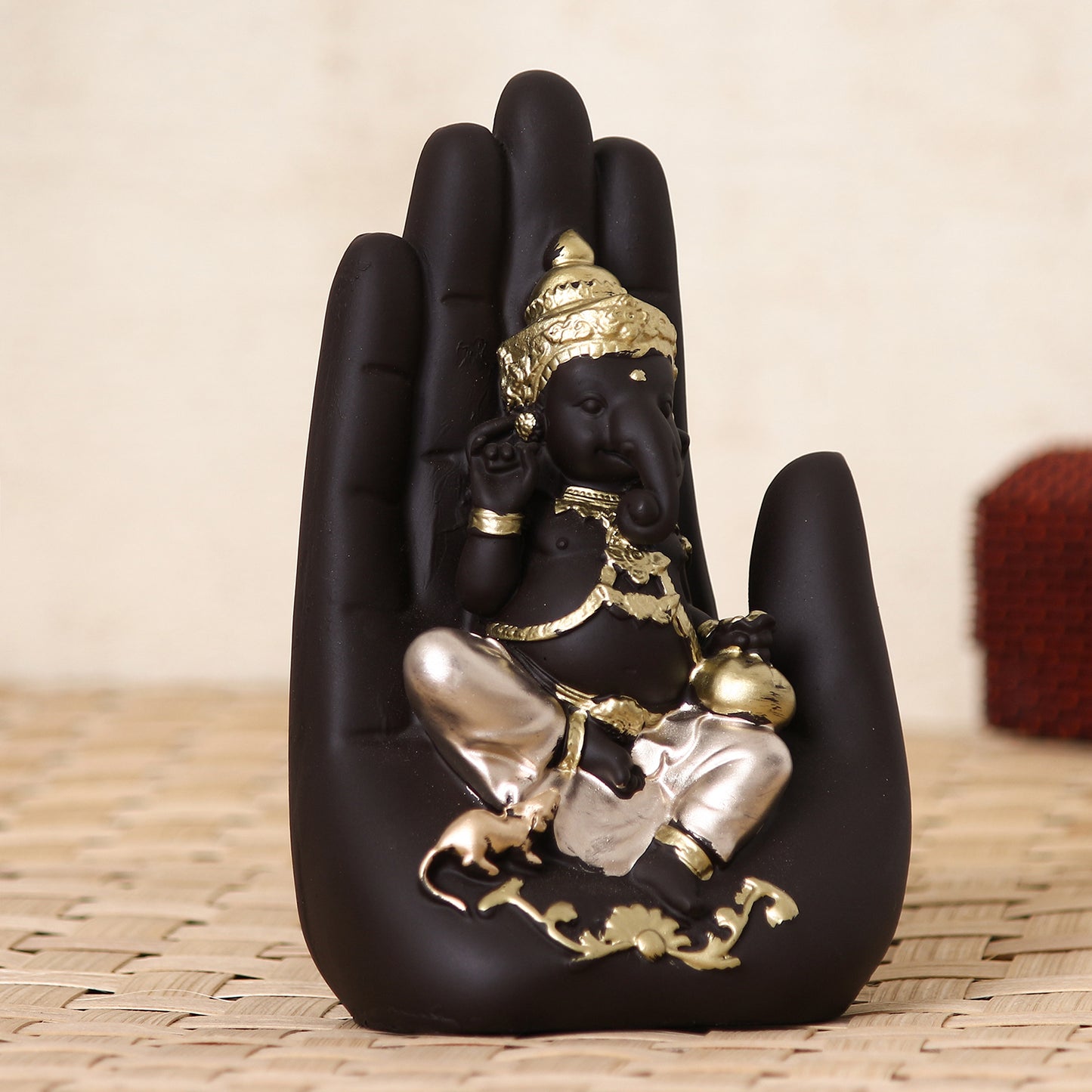 Black and Gold Lord Ganesha in Hand Statue